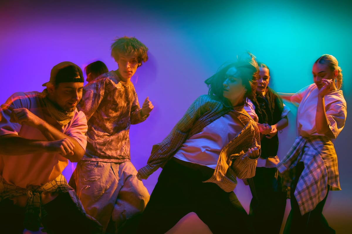 Performers in dramatic motion — premium arts and culture photography